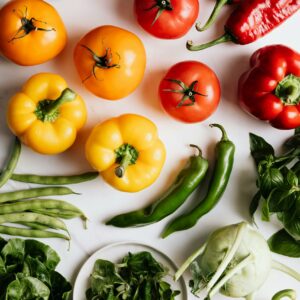 An Assortment of Fruits and Vegetables on a White Surface